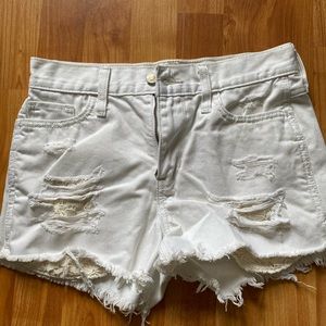 White distressed mid rise Hollister shorts